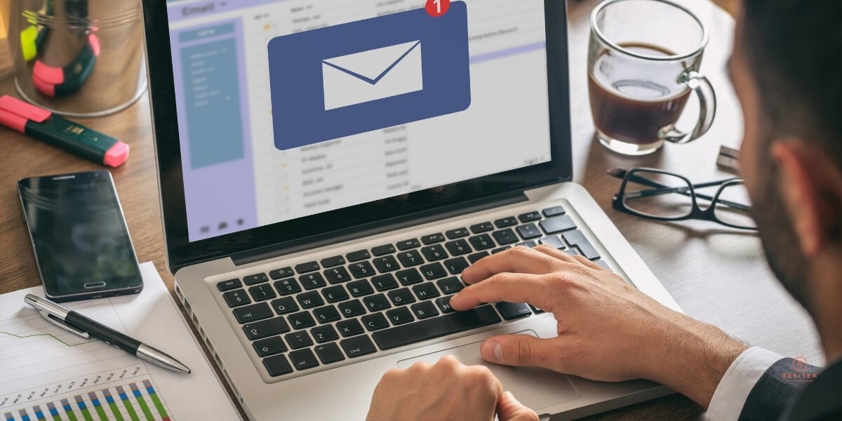 Business professional using secure email filtering on laptop in modern Montreal office